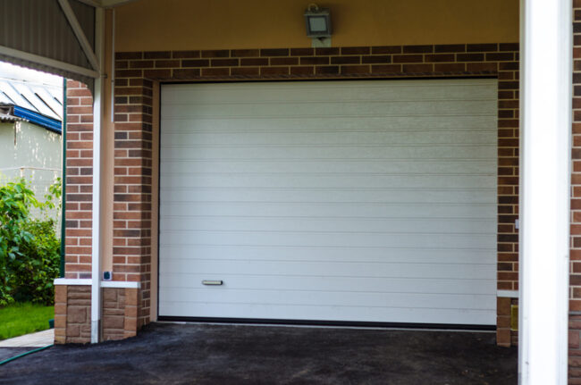 Deciding Between Repairing or Replacing Your Garage Door